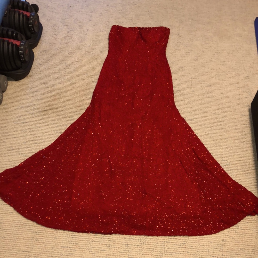 Red beaded strapless ball gown